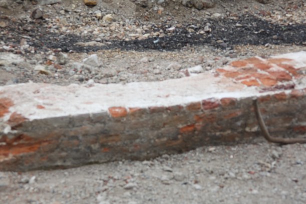Excavated foundation wall of Tudor storehouse 2011. Image by Ann Coats.