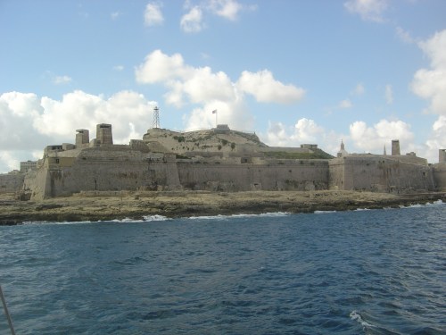 C16 Fort St Elmo at the mouth of Grand Harbour, with Second World War towers. Image by J. D. Davies.